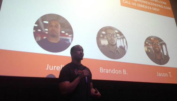 Presenting Home Scene Pro on stage with the founding team slide behind the speaker