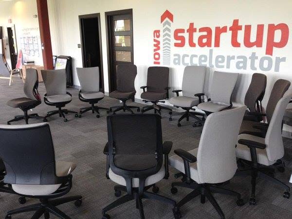 Chairs arranged for discussion inside the Iowa Startup Accelerator space